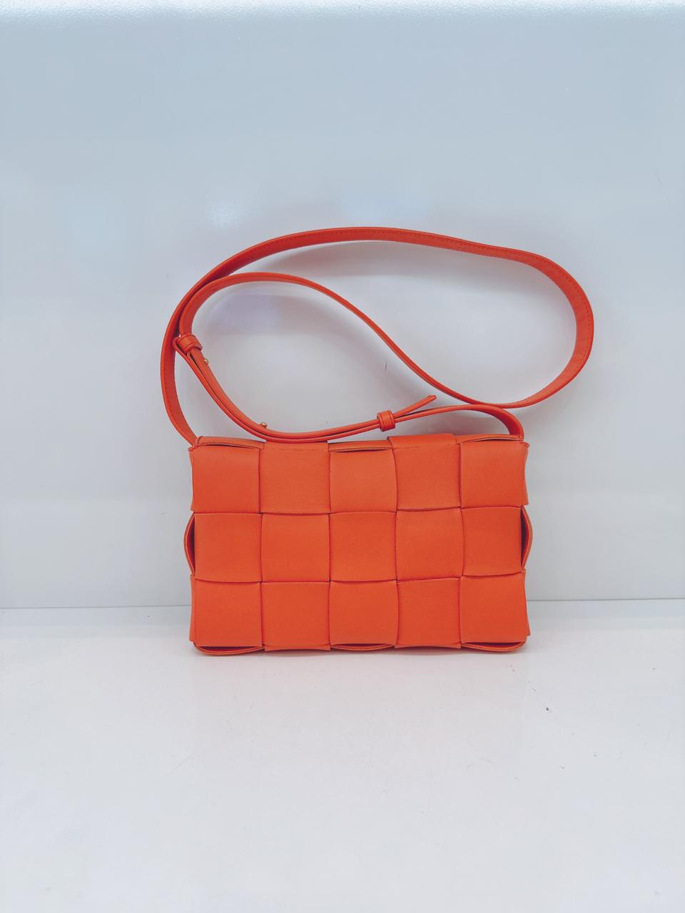 ORANGE LAMBSKIN INTRECCIATO CASSETTE CROSSBODY BAG