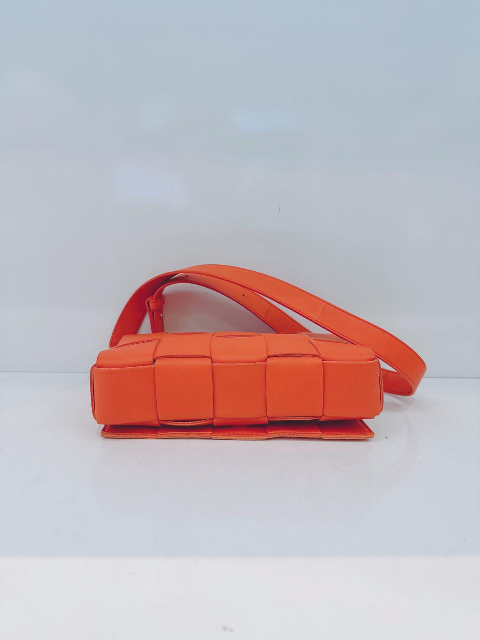 ORANGE LAMBSKIN INTRECCIATO CASSETTE CROSSBODY BAG