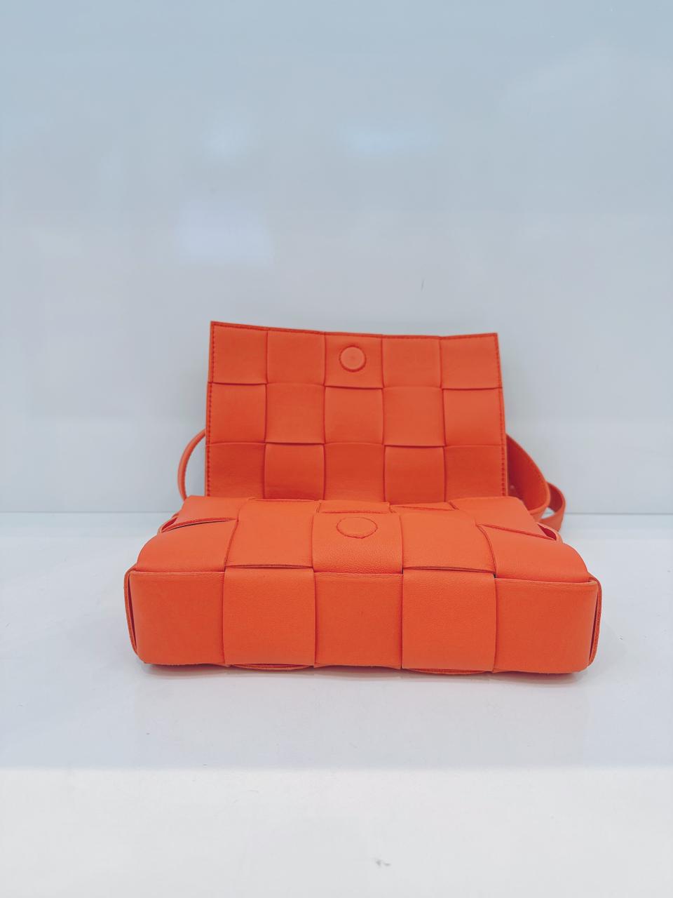 ORANGE LAMBSKIN INTRECCIATO CASSETTE CROSSBODY BAG