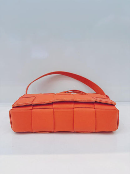 ORANGE LAMBSKIN INTRECCIATO CASSETTE CROSSBODY BAG