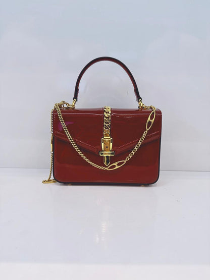 SYLVIE 1969 RED PATENT LEATHER TOP HANDLE BAG