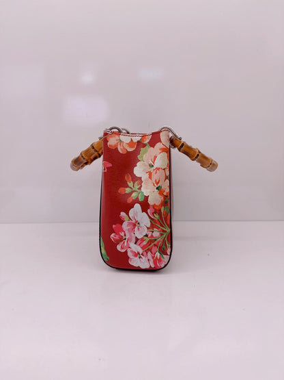 RED MULTICOLOR BLOOMS PRINT LEATHER MINI BAMBOO TOTE