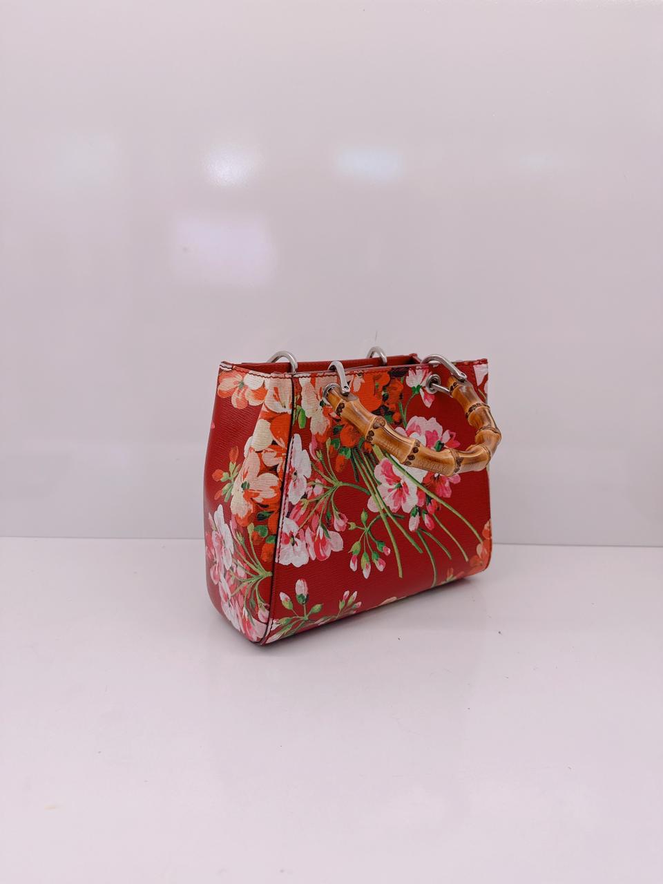RED MULTICOLOR BLOOMS PRINT LEATHER MINI BAMBOO TOTE