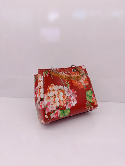RED MULTICOLOR BLOOMS PRINT LEATHER MINI BAMBOO TOTE