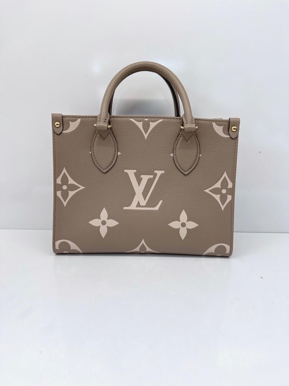 TOURTERELLE CRÈME BICOLOR MONOGRAM EMPREINTE LEATHER ONTHEGO PM TOTE BAG