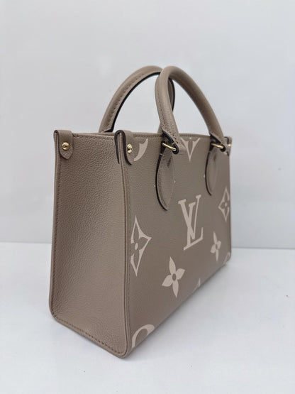 TOURTERELLE CRÈME BICOLOR MONOGRAM EMPREINTE LEATHER ONTHEGO PM TOTE BAG