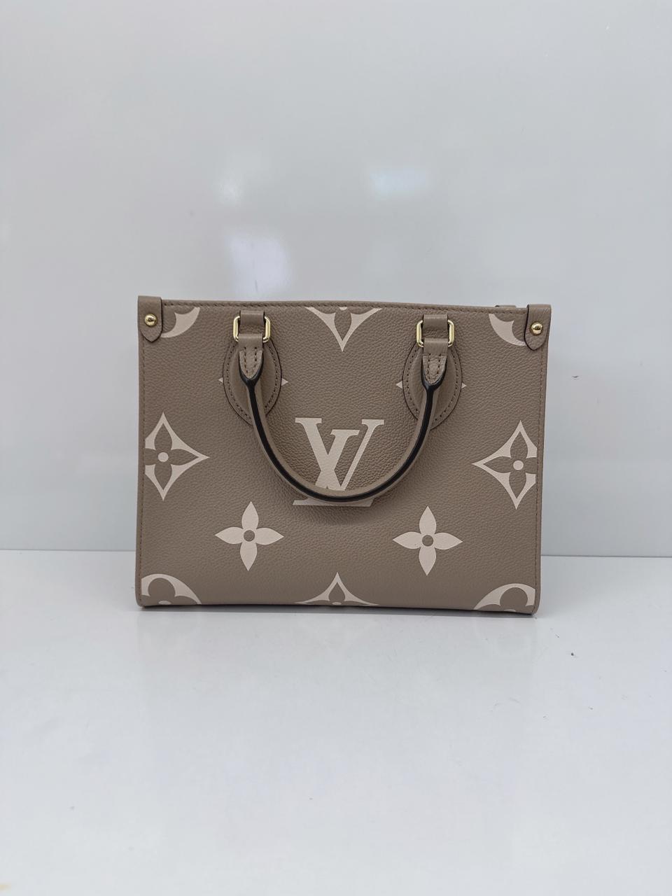 TOURTERELLE CRÈME BICOLOR MONOGRAM EMPREINTE LEATHER ONTHEGO PM TOTE BAG