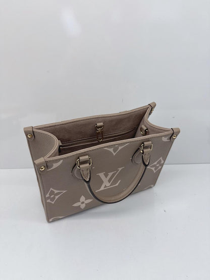 TOURTERELLE CRÈME BICOLOR MONOGRAM EMPREINTE LEATHER ONTHEGO PM TOTE BAG
