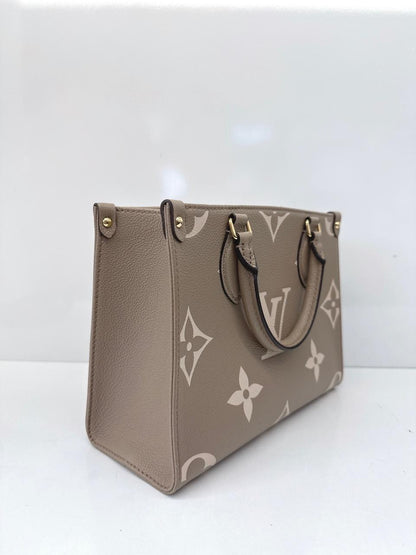 TOURTERELLE CRÈME BICOLOR MONOGRAM EMPREINTE LEATHER ONTHEGO PM TOTE BAG