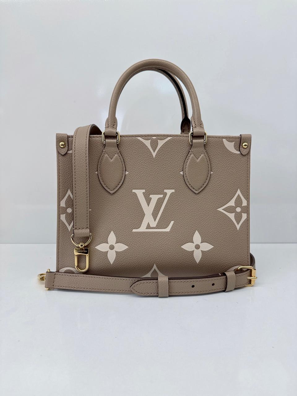 TOURTERELLE CRÈME BICOLOR MONOGRAM EMPREINTE LEATHER ONTHEGO PM TOTE BAG