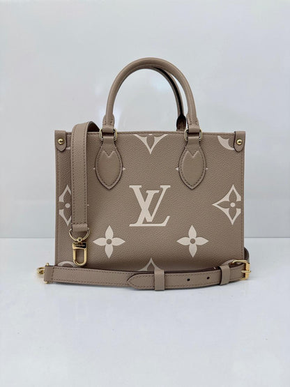 TOURTERELLE CRÈME BICOLOR MONOGRAM EMPREINTE LEATHER ONTHEGO PM TOTE BAG