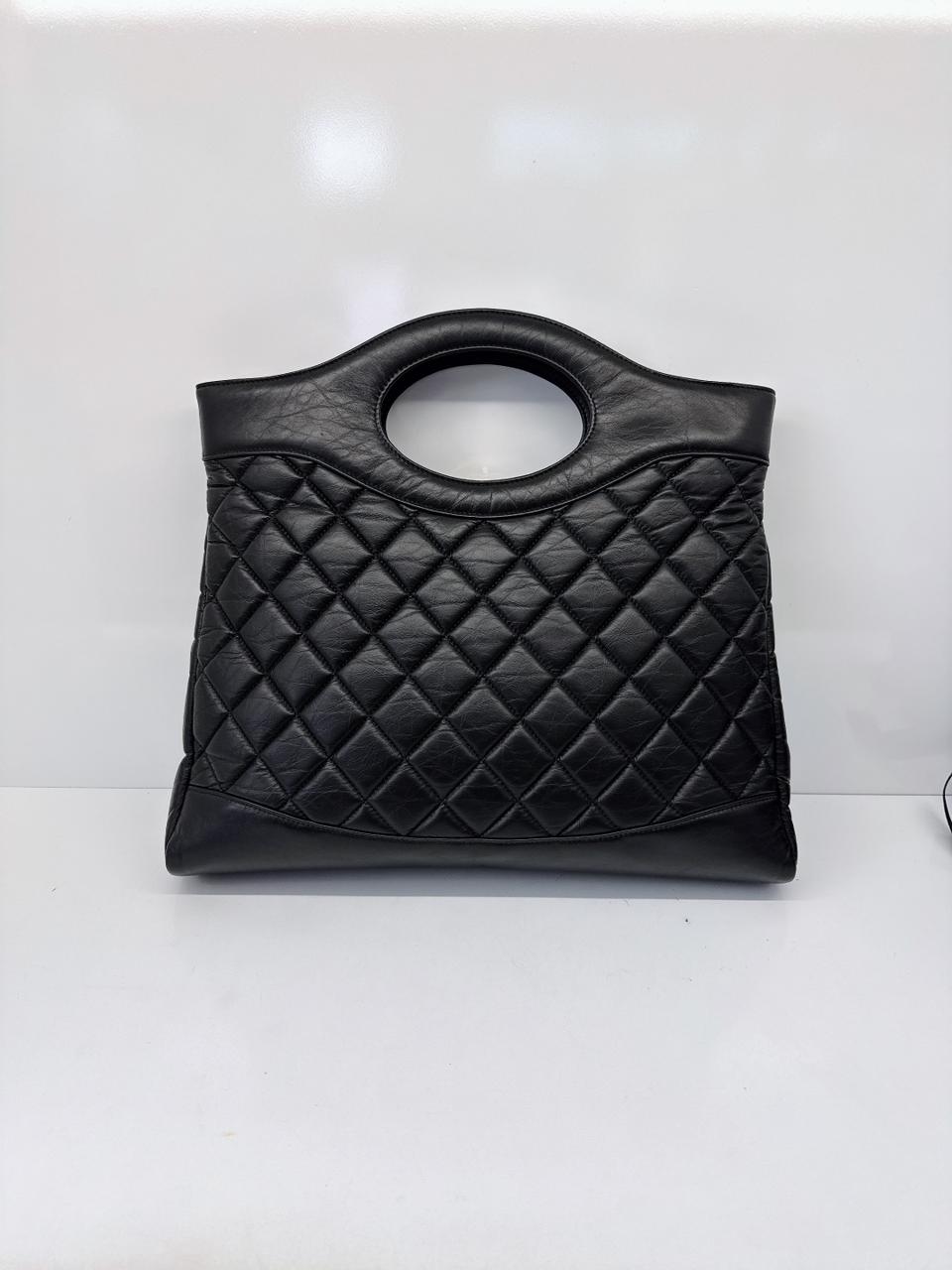 BLACK LAMBSKIN LEATHER LARGE CHANEL 31 SHOPPING BAG GOLD HARDWARE
