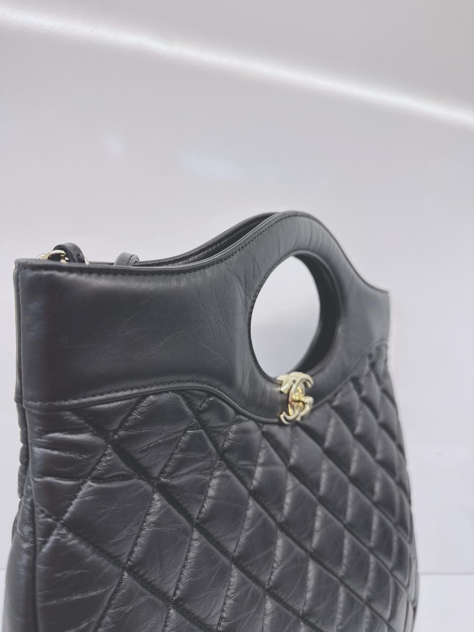 BLACK LAMBSKIN LEATHER LARGE CHANEL 31 SHOPPING BAG GOLD HARDWARE