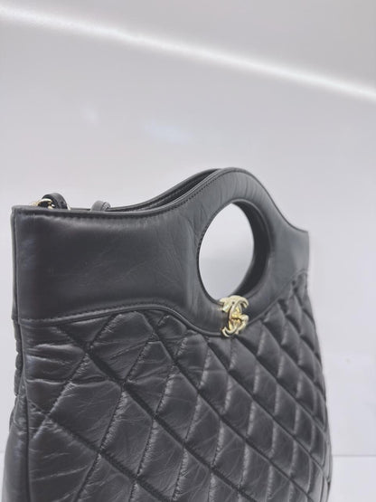 BLACK LAMBSKIN LEATHER LARGE CHANEL 31 SHOPPING BAG GOLD HARDWARE