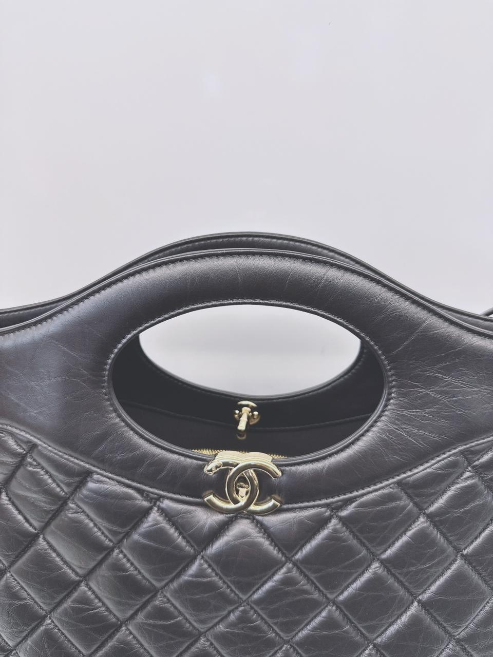 BLACK LAMBSKIN LEATHER LARGE CHANEL 31 SHOPPING BAG GOLD HARDWARE