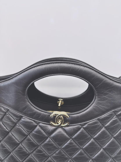 BLACK LAMBSKIN LEATHER LARGE CHANEL 31 SHOPPING BAG GOLD HARDWARE