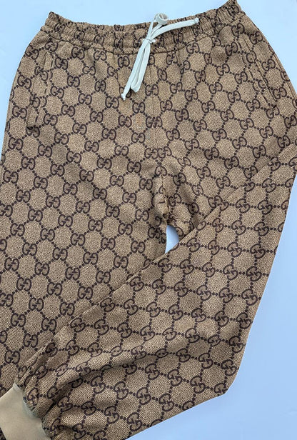 BROWN GG MONOGRAM TECHNICAL JERSEY TRACK PANTS L