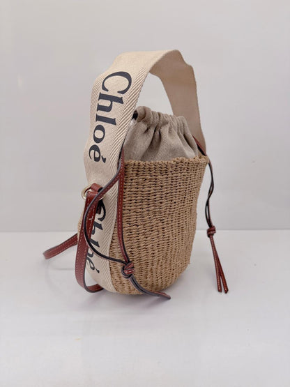 WOODY SMALL LEATHER TRIMMED RAFFIA BASKET BAG