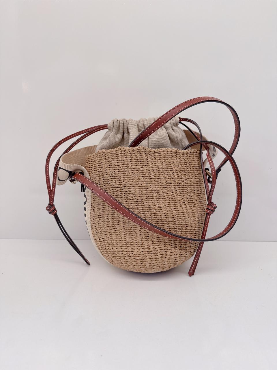 WOODY SMALL LEATHER TRIMMED RAFFIA BASKET BAG