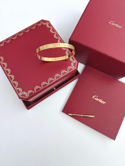 18K YELLOW GOLD BANGLE LOVE BRACELET, CLASSIC MODEL 17