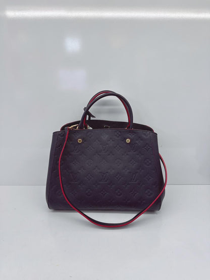 MARINE ROUGE MONOGRAM EMPREINTE LEATHER MONTAIGNE MM BAG