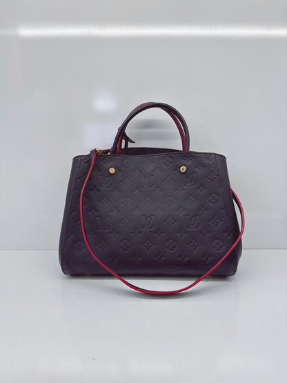 MARINE ROUGE MONOGRAM EMPREINTE LEATHER MONTAIGNE MM BAG