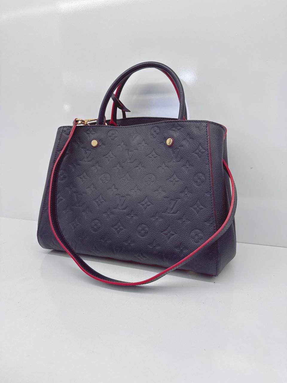 MARINE ROUGE MONOGRAM EMPREINTE LEATHER MONTAIGNE MM BAG