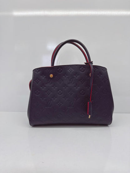 MARINE ROUGE MONOGRAM EMPREINTE LEATHER MONTAIGNE MM BAG