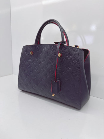MARINE ROUGE MONOGRAM EMPREINTE LEATHER MONTAIGNE MM BAG