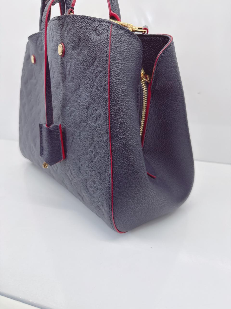 MARINE ROUGE MONOGRAM EMPREINTE LEATHER MONTAIGNE MM BAG