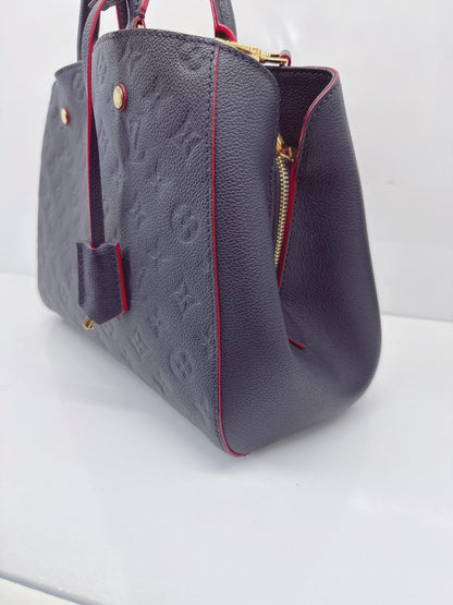 MARINE ROUGE MONOGRAM EMPREINTE LEATHER MONTAIGNE MM BAG