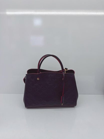 MARINE ROUGE MONOGRAM EMPREINTE LEATHER MONTAIGNE MM BAG