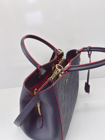 MARINE ROUGE MONOGRAM EMPREINTE LEATHER MONTAIGNE MM BAG
