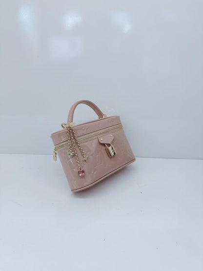 DESERT SAND MONOGRAM EMPREINTE VANITY CHAIN POUCH