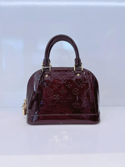 AMARANTE MONOGRAM VERNIS ALMA BB