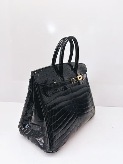 BLACK CROCODILE NILOTICUS LISSE BIRKIN 25 GOLD HARDWARE