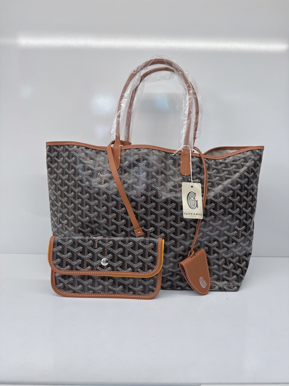BLACK AND TAN GOYARDINE CANVAS AND CHEVROCHES CALFSKIN SAINT LOUIS PM BAG