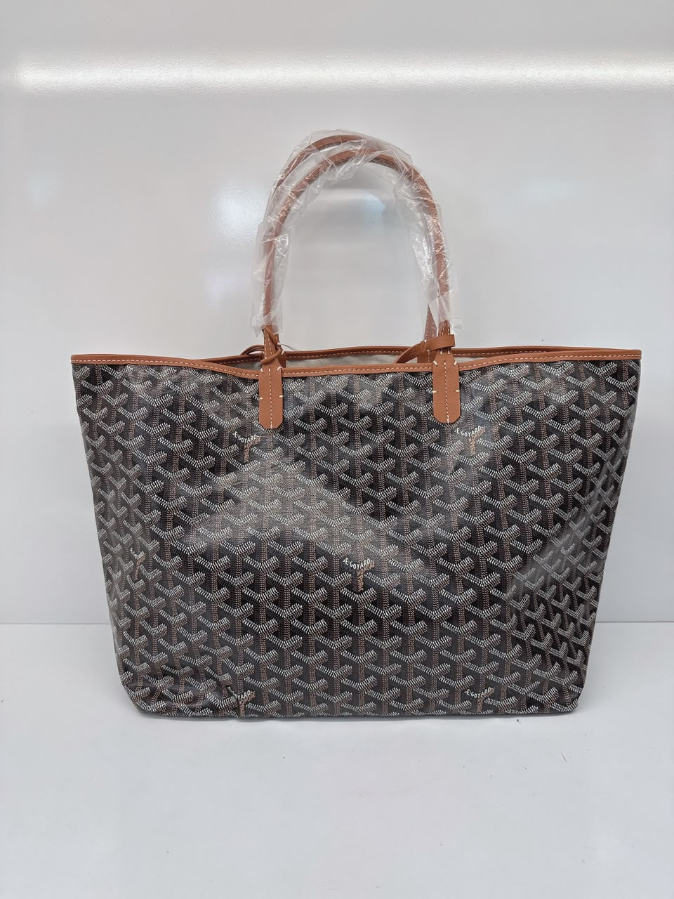 BLACK AND TAN GOYARDINE CANVAS AND CHEVROCHES CALFSKIN SAINT LOUIS PM BAG