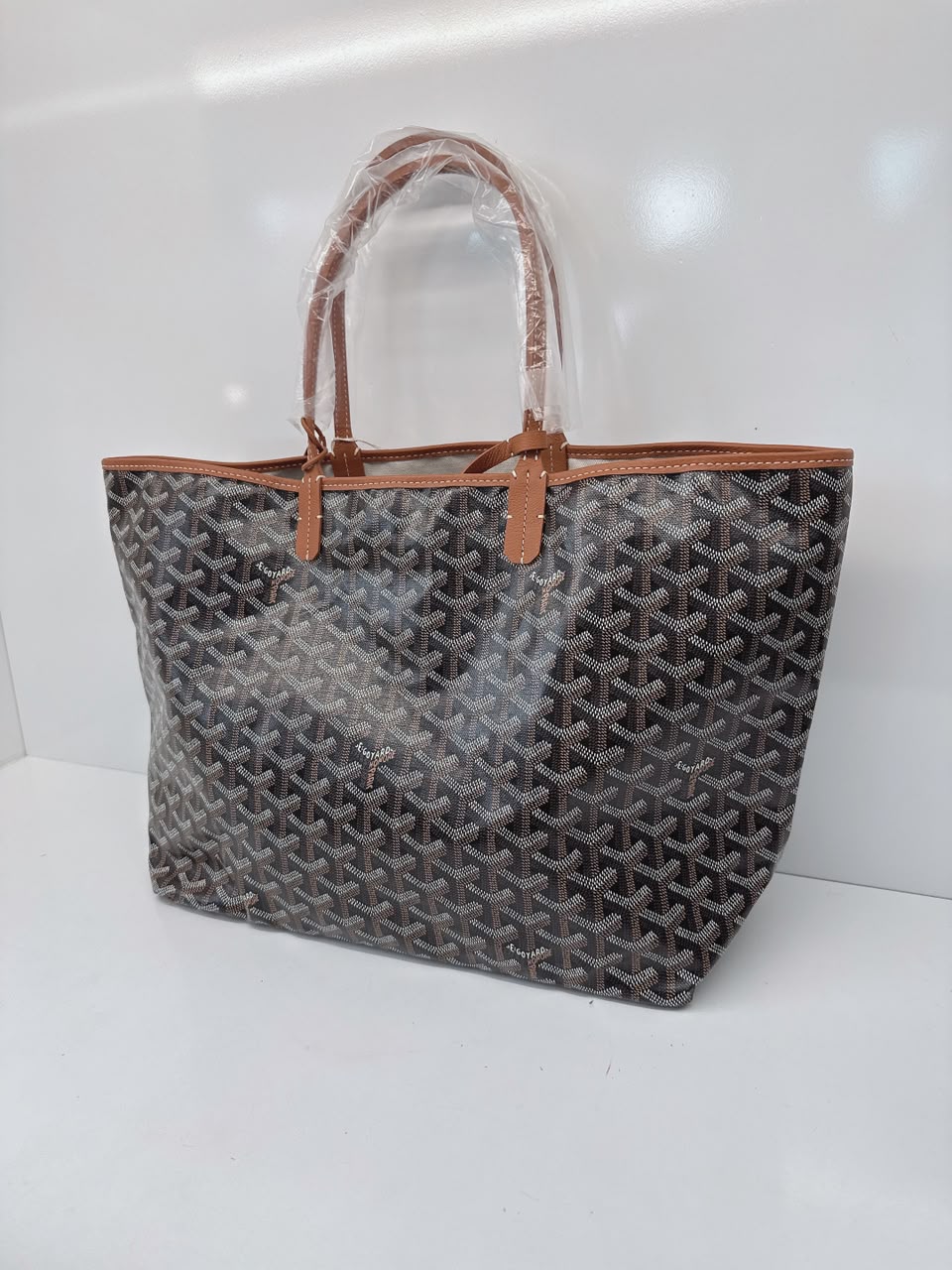 BLACK AND TAN GOYARDINE CANVAS AND CHEVROCHES CALFSKIN SAINT LOUIS PM BAG