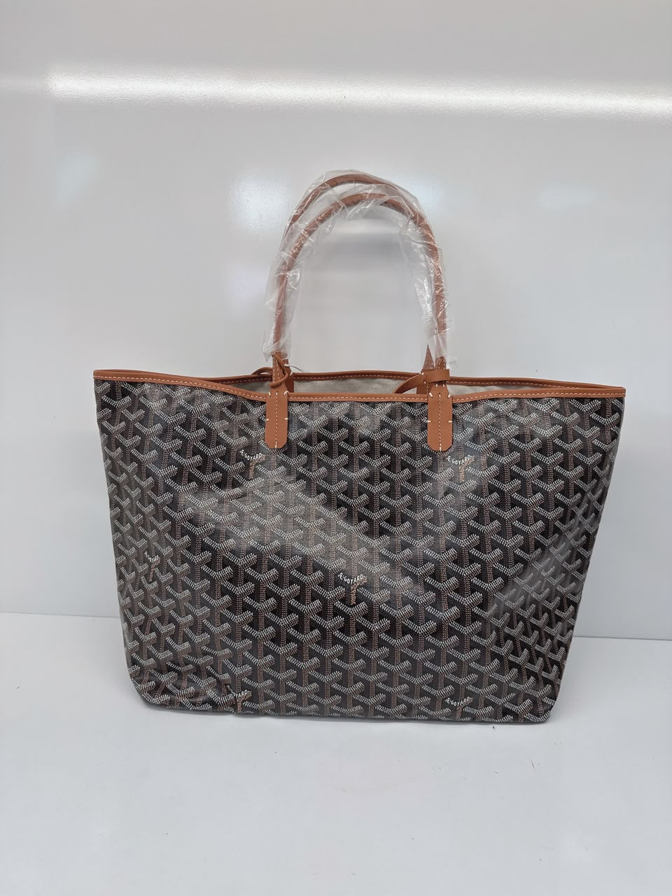 BLACK AND TAN GOYARDINE CANVAS AND CHEVROCHES CALFSKIN SAINT LOUIS PM BAG