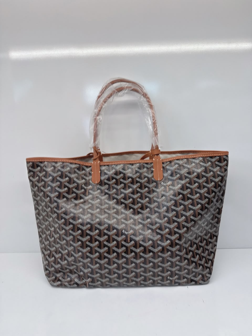 BLACK AND TAN GOYARDINE CANVAS AND CHEVROCHES CALFSKIN SAINT LOUIS PM BAG