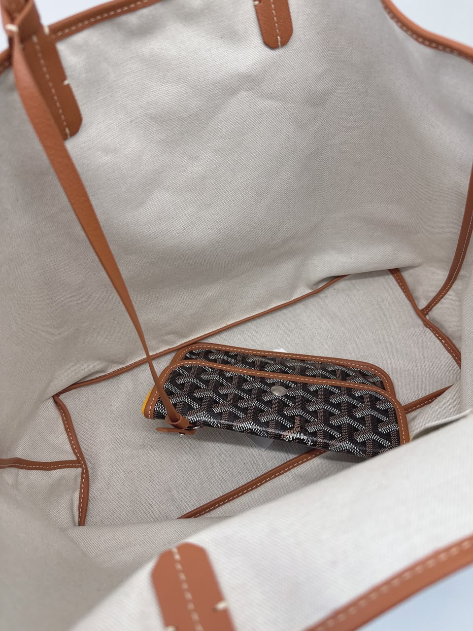 BLACK AND TAN GOYARDINE CANVAS AND CHEVROCHES CALFSKIN SAINT LOUIS PM BAG