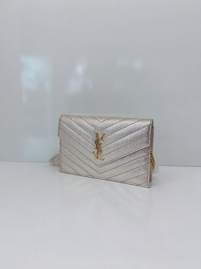GOLD TEXTURED MONOGRAM SMALL CASSANDRE ENVELOPE WALLET ON CHAIN