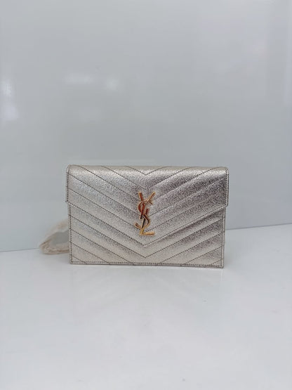 GOLD TEXTURED MONOGRAM SMALL CASSANDRE ENVELOPE WALLET ON CHAIN