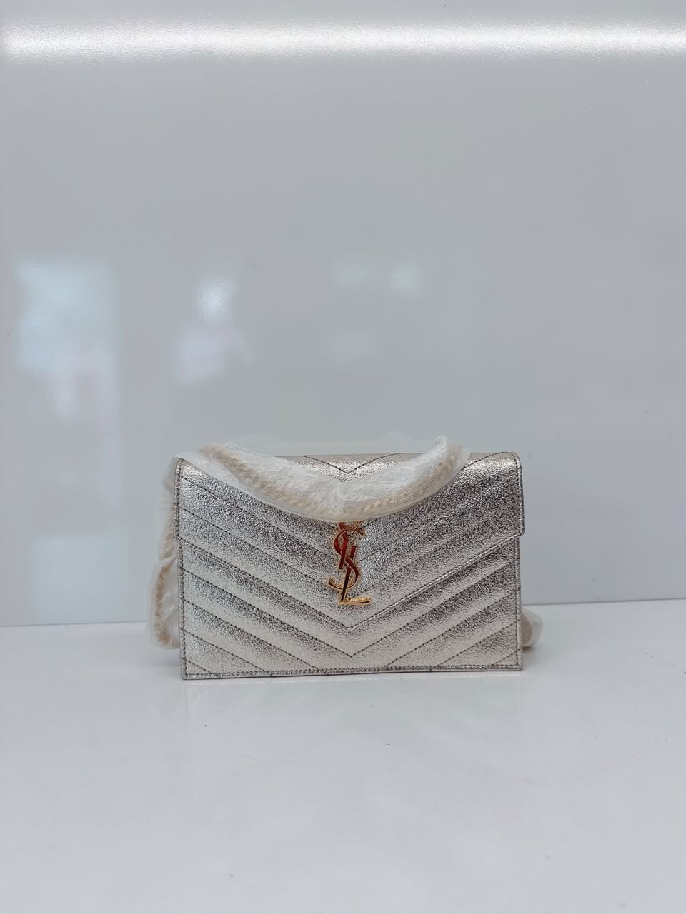 GOLD TEXTURED MONOGRAM SMALL CASSANDRE ENVELOPE WALLET ON CHAIN