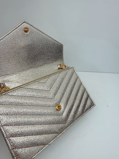 GOLD TEXTURED MONOGRAM SMALL CASSANDRE ENVELOPE WALLET ON CHAIN