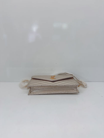 GOLD TEXTURED MONOGRAM SMALL CASSANDRE ENVELOPE WALLET ON CHAIN