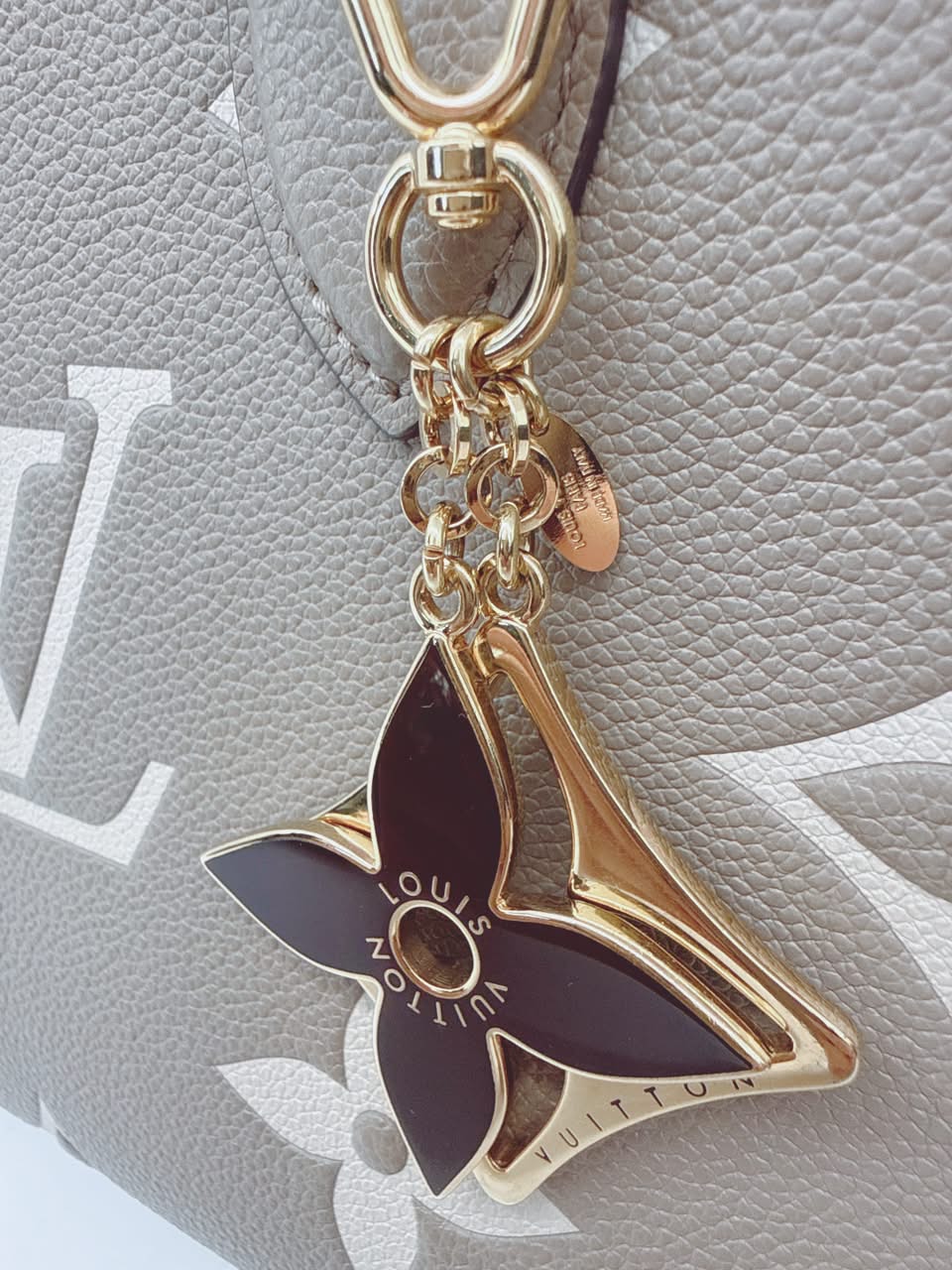 GOLD TONE AND BLACK ENAMEL PUZZLE KEY RING AND BAG CHARM