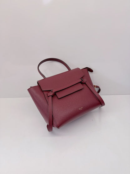 BURGUNDY LEATHER NANO BELT TOP HANDLE BAG