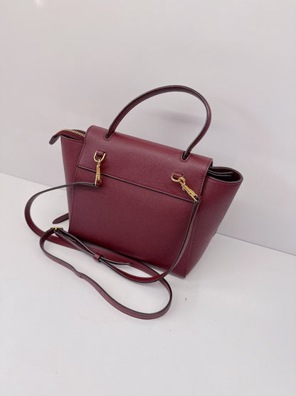 BURGUNDY LEATHER NANO BELT TOP HANDLE BAG